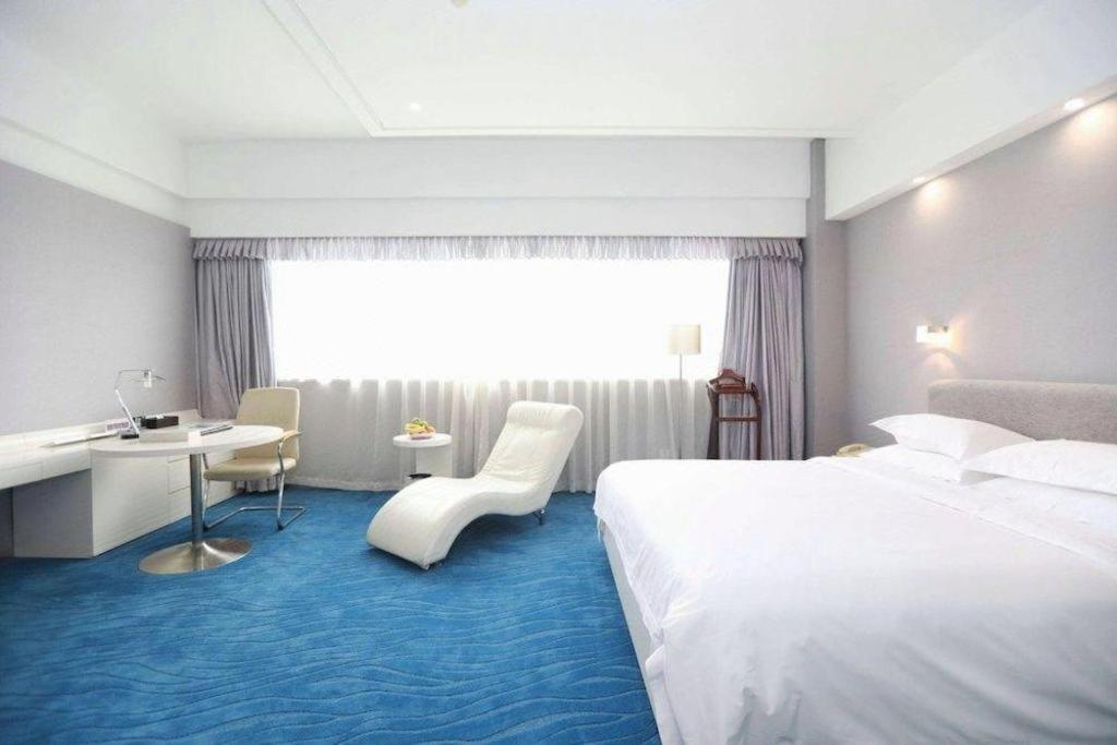 Ramada Plaza By Wyndham Hangzhou Riverside Exterior foto